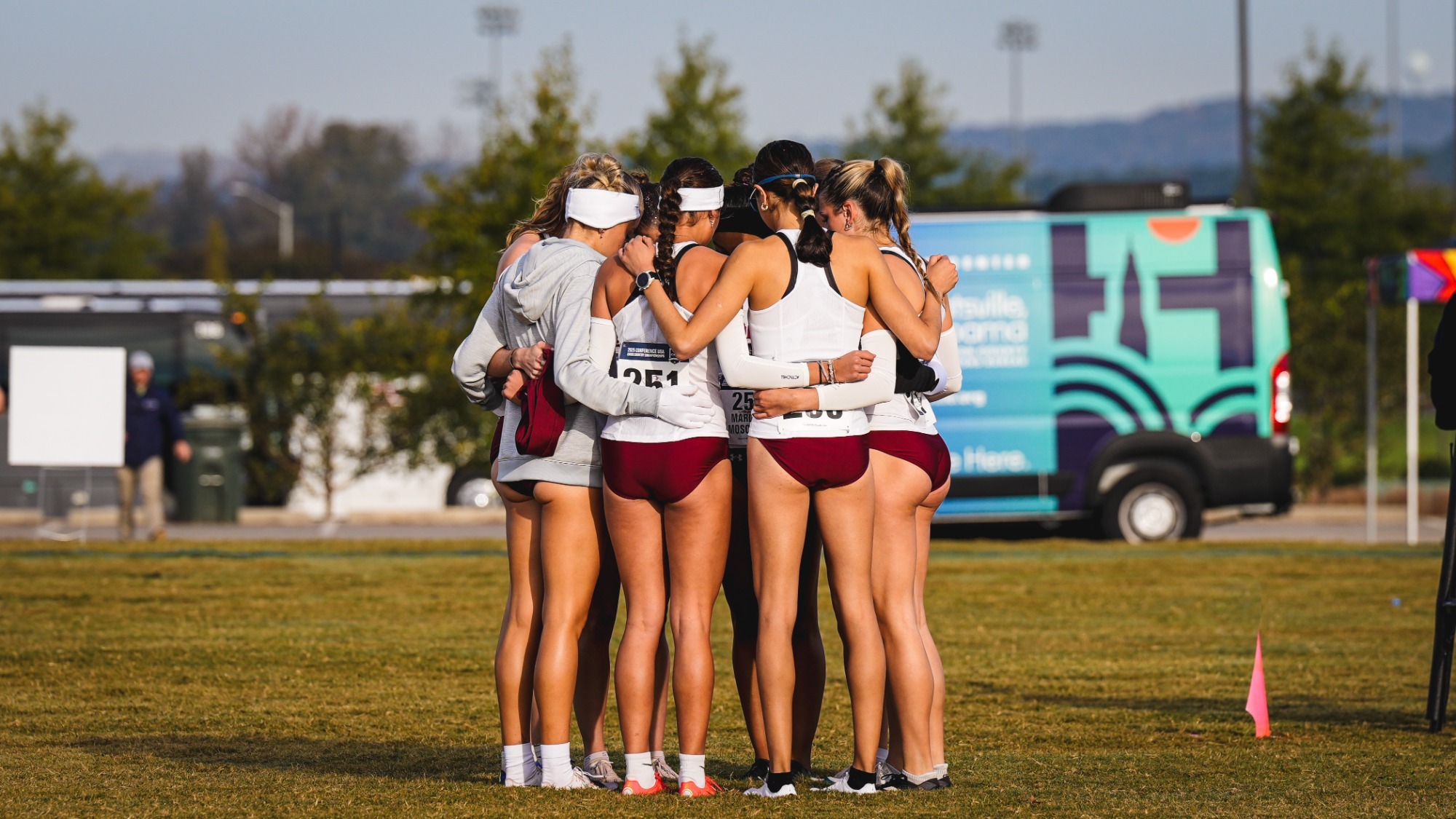 Team huddle ahead of the women's cross country race at the 2025 XC Championships