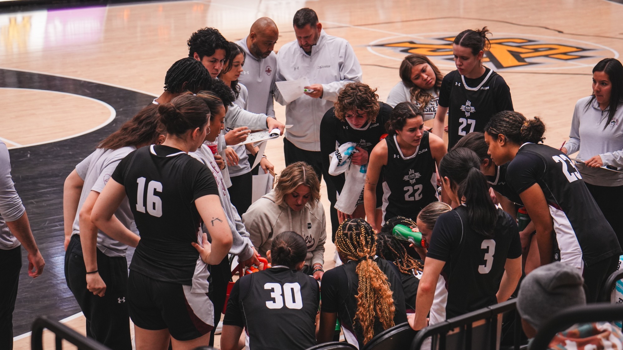 Team huddle during a road game against Kennesaw State (1/24)