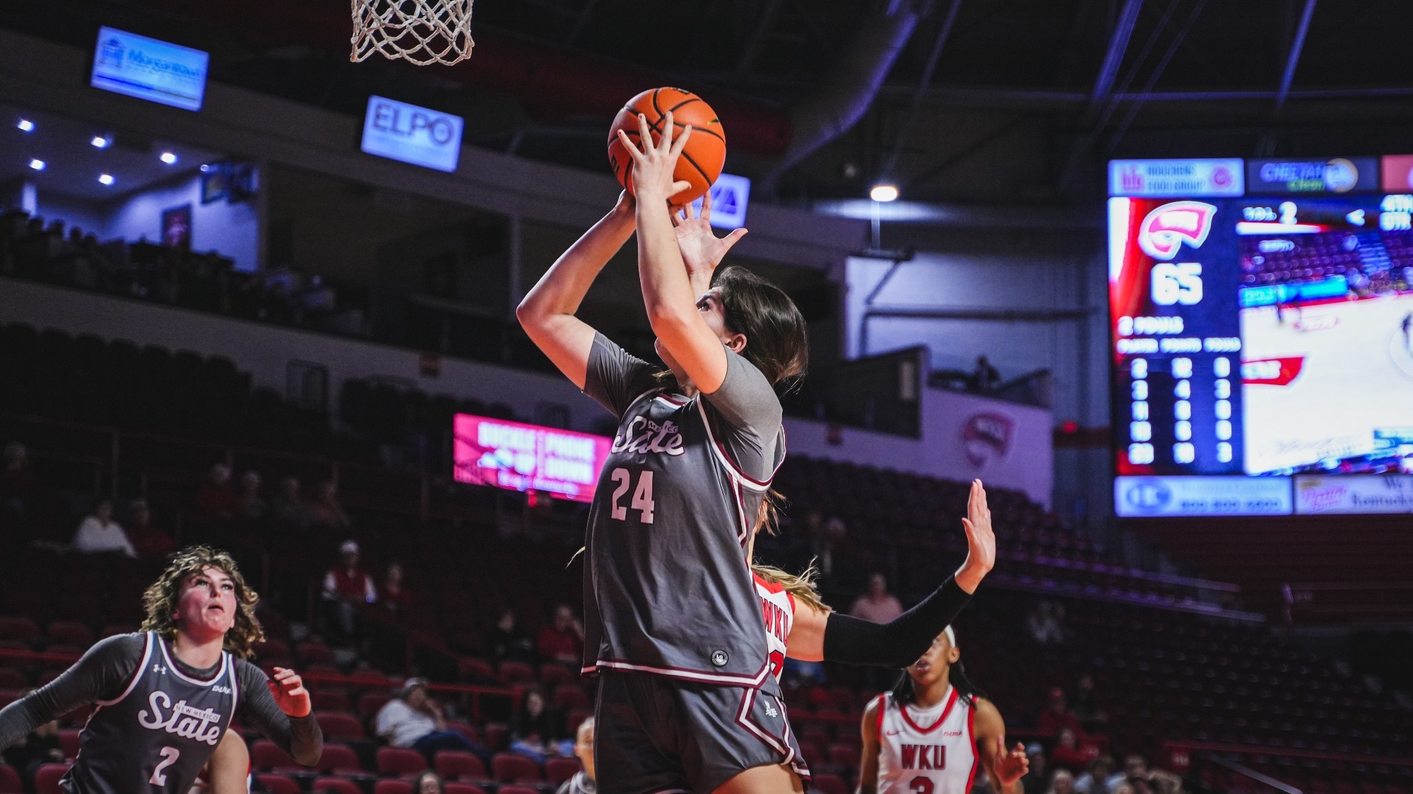 Lucía Yenes driving for a basket against WKU (1/8)