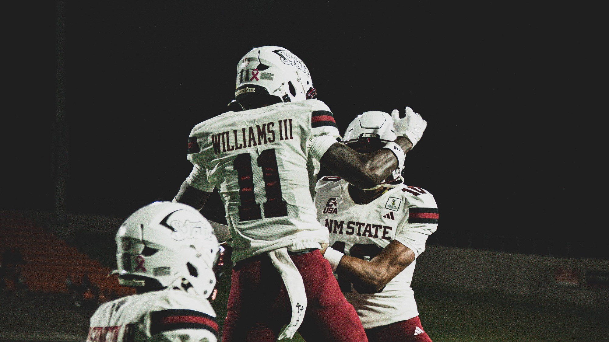 AJ Williams and team celebrating a touchdown against Sam Houston (10/21)