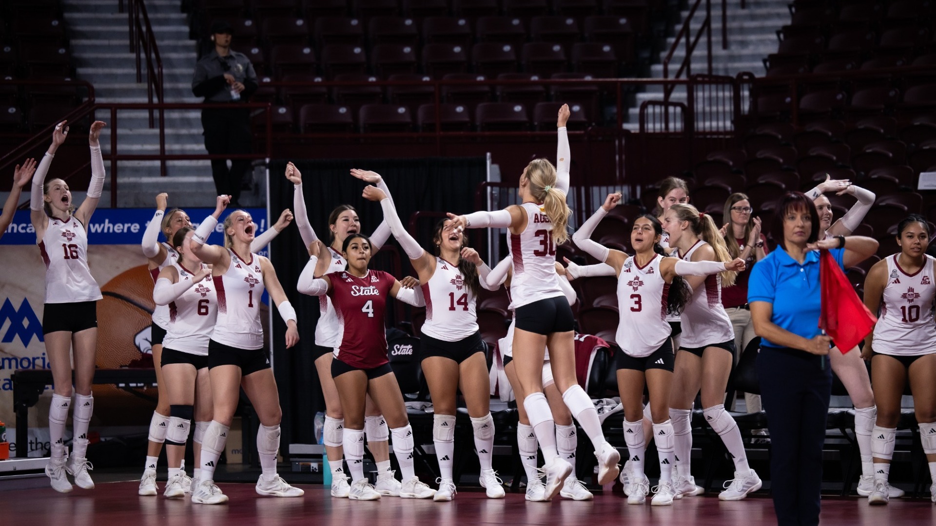 Aggies celebrate a 5 set victory