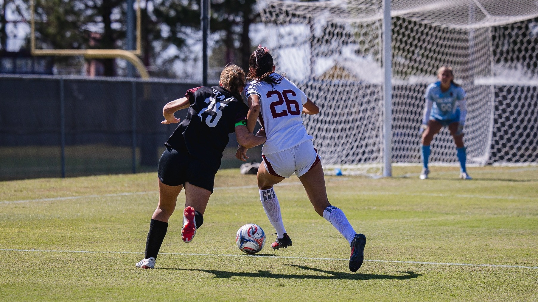 Milly Eyrich fighting for a ball against Mo State (10/18)