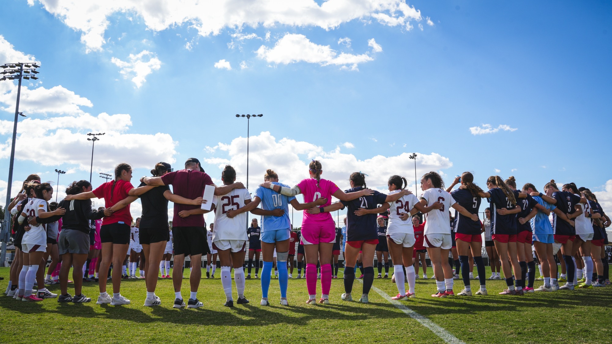 Team huddle along with Liberty following match against the Flames (10/4)