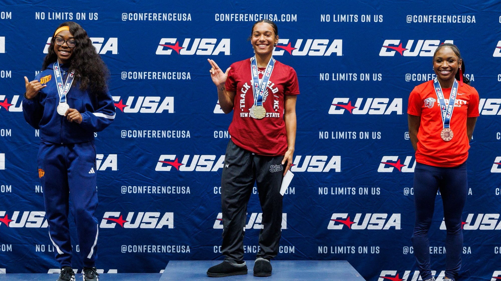 Marlee Cavitt on the champion podium at the 2026 CUSA Indoor Track & Field Championships 
