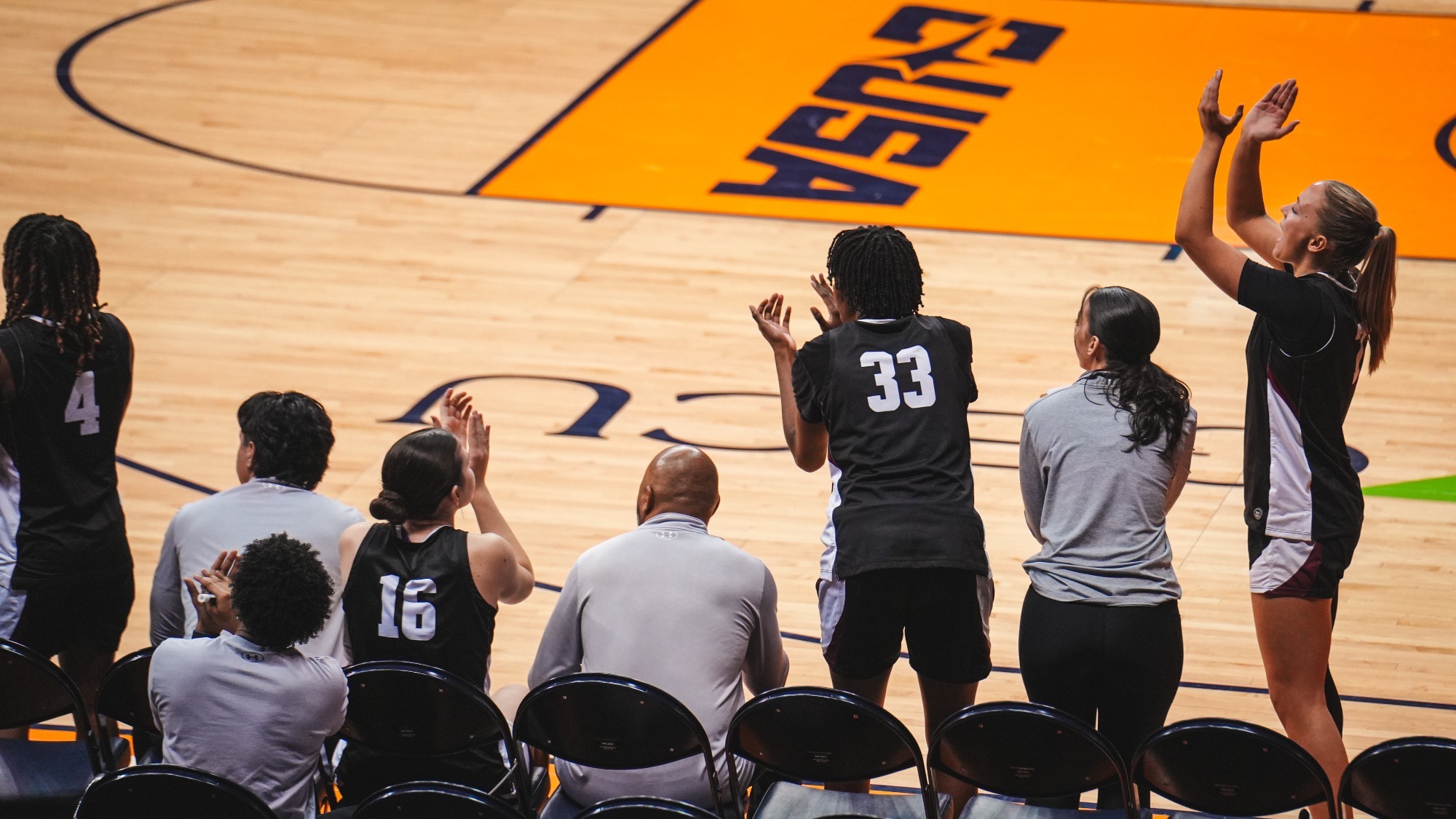 Team bench celebrating a made basket against UTEP (1/31)