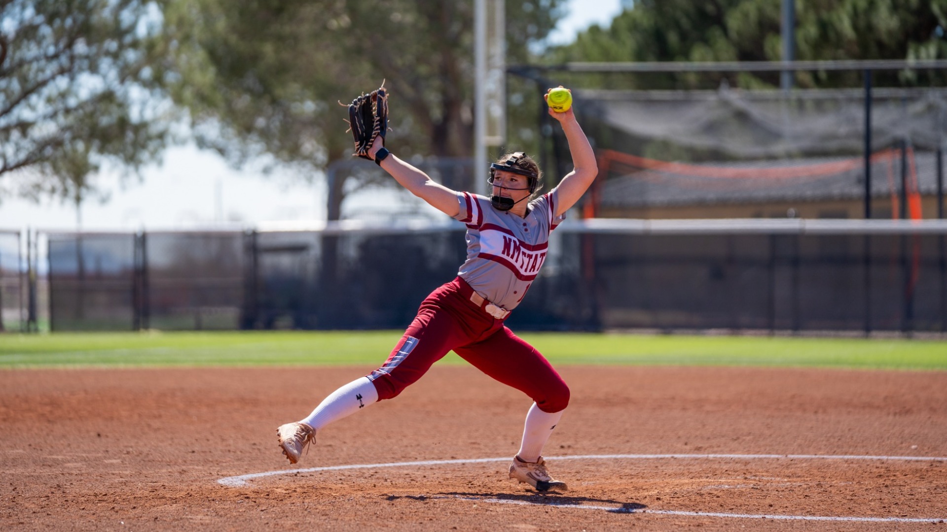 Faith throwing a pitch