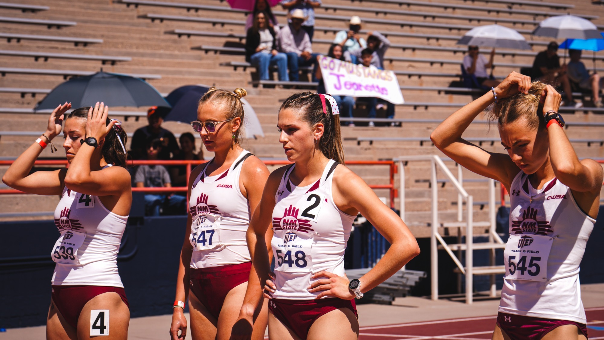 Aggie quartet competing in the 800m at the Miners Invitational
