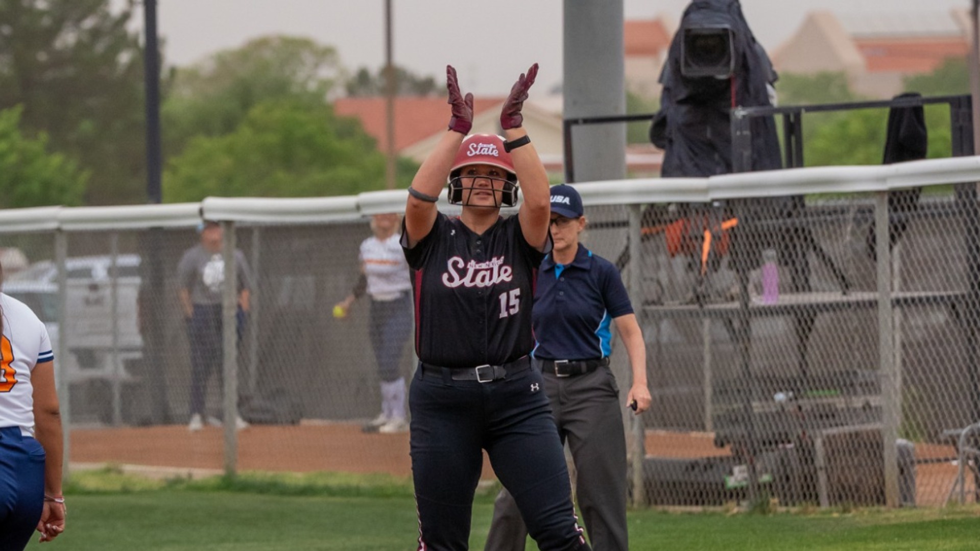Madi Bachman reaches base