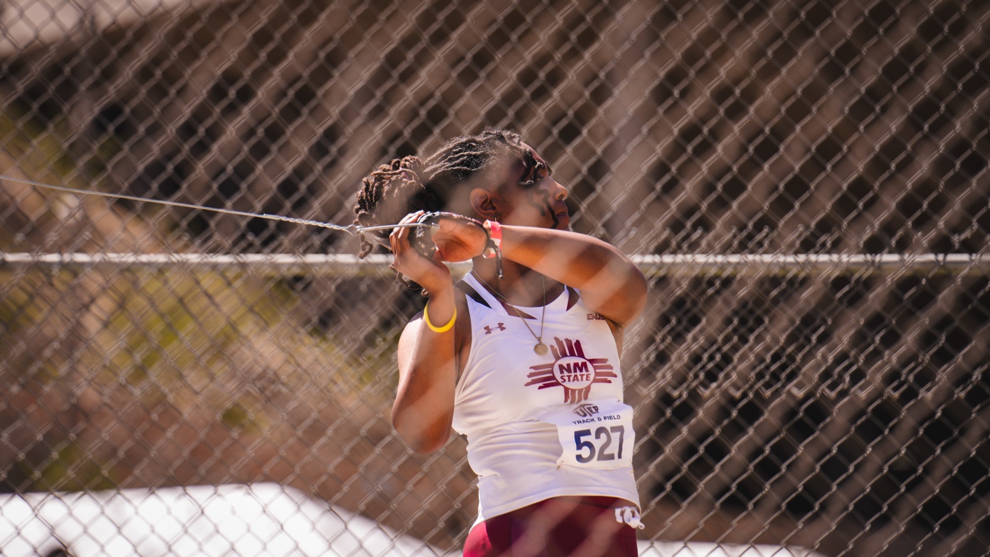 Kamryn Cadle competing in the hammer throw at the Miners Invitational