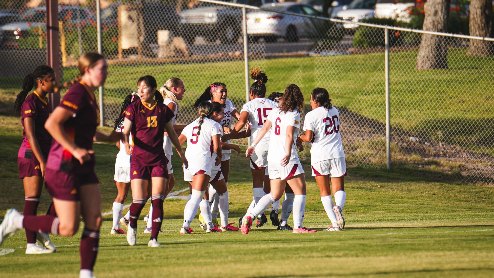 Team celebrating a goal scored against Arizona State (8/12)