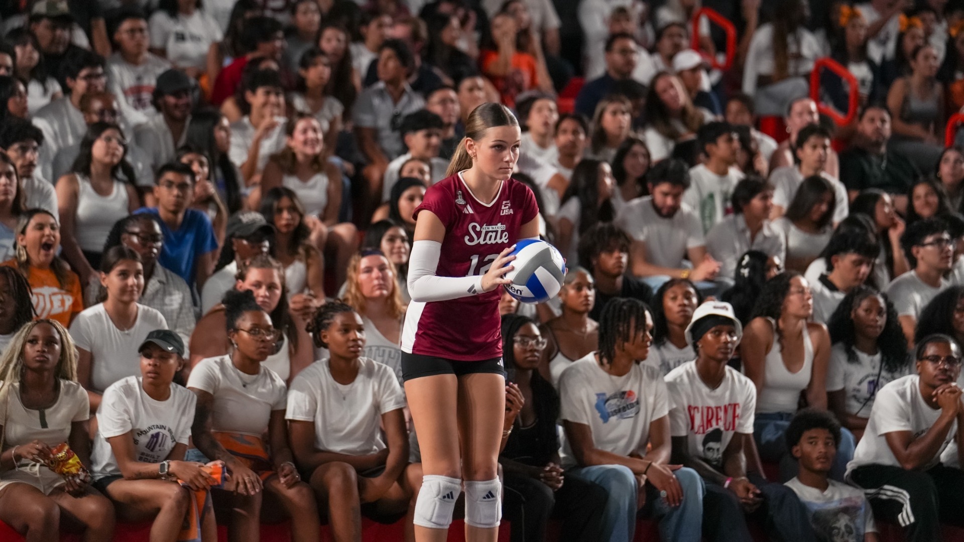 Paige Nelson Sets up for a serve