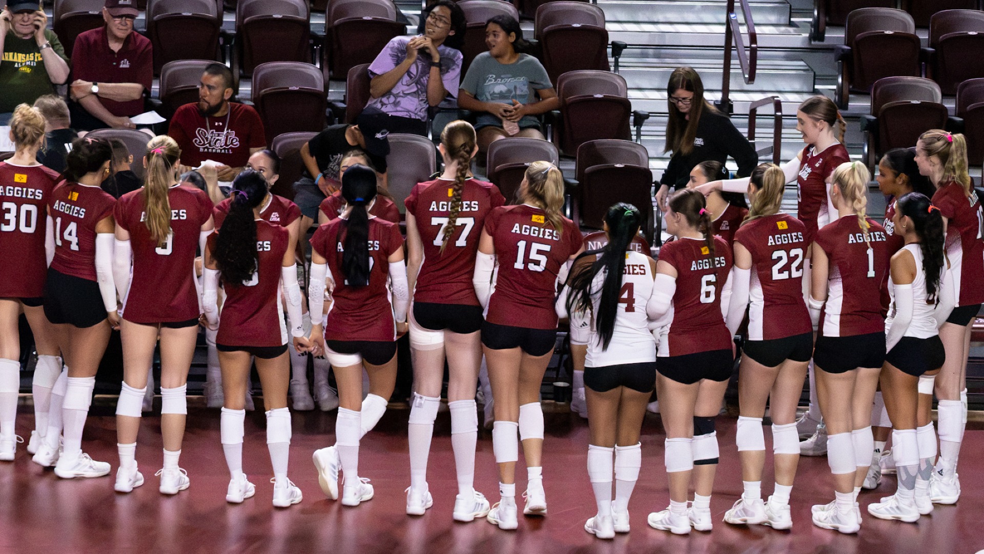 Aggies huddle up during a VB game