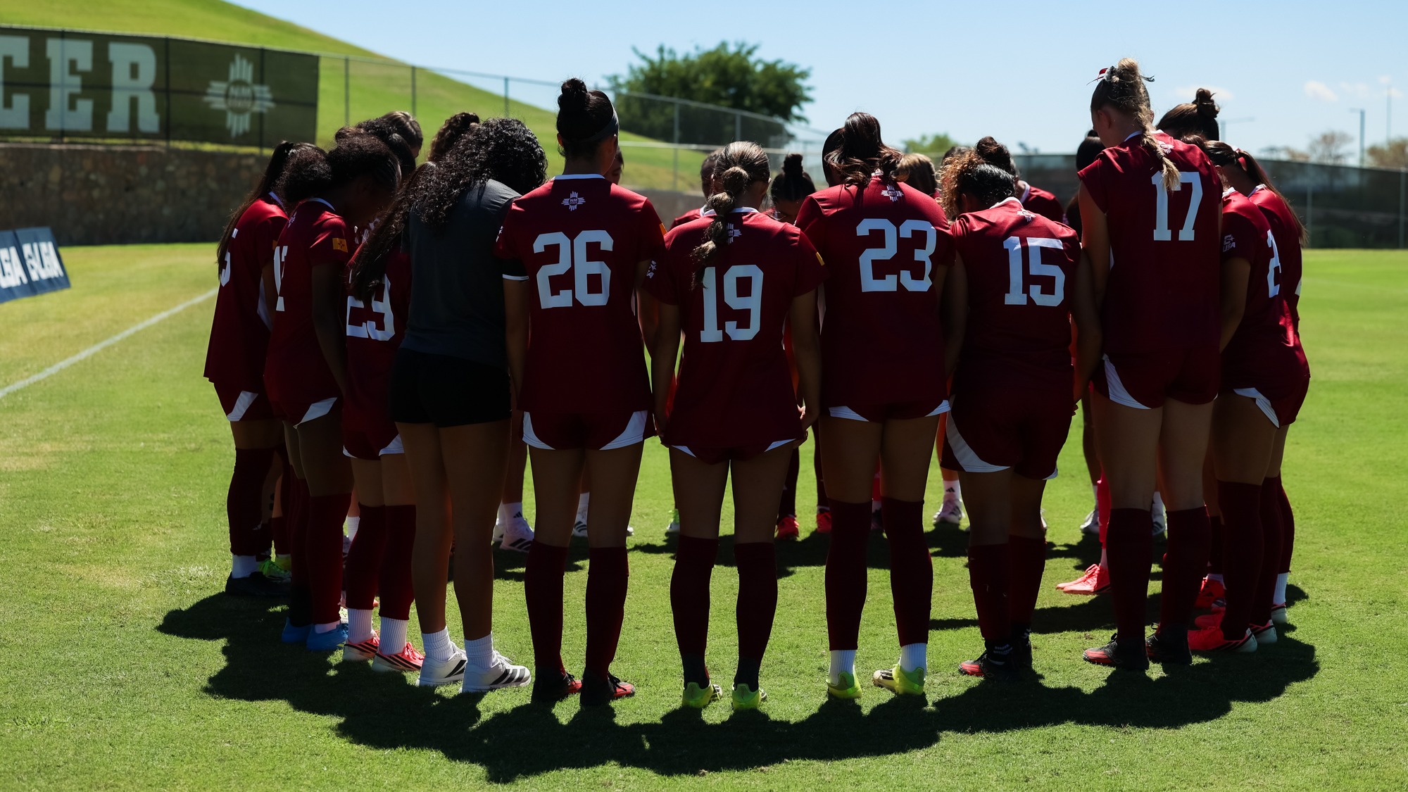Team huddle ahead of the match against NAU (9/20)