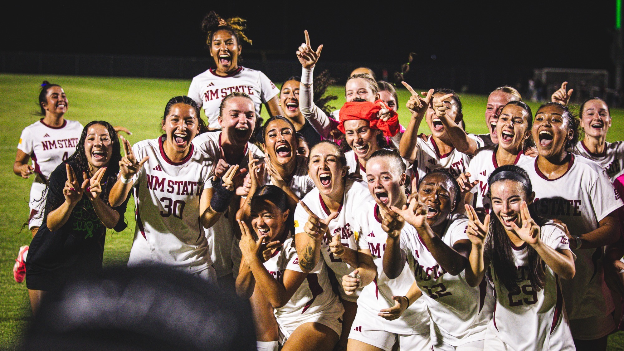 Team celebrating a home victory over FIU (9/27)