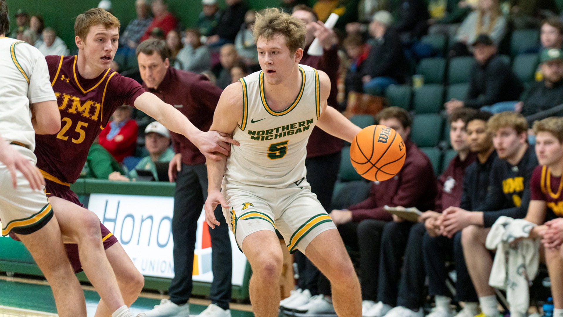 Brooks Hinson looks to drive on his defender