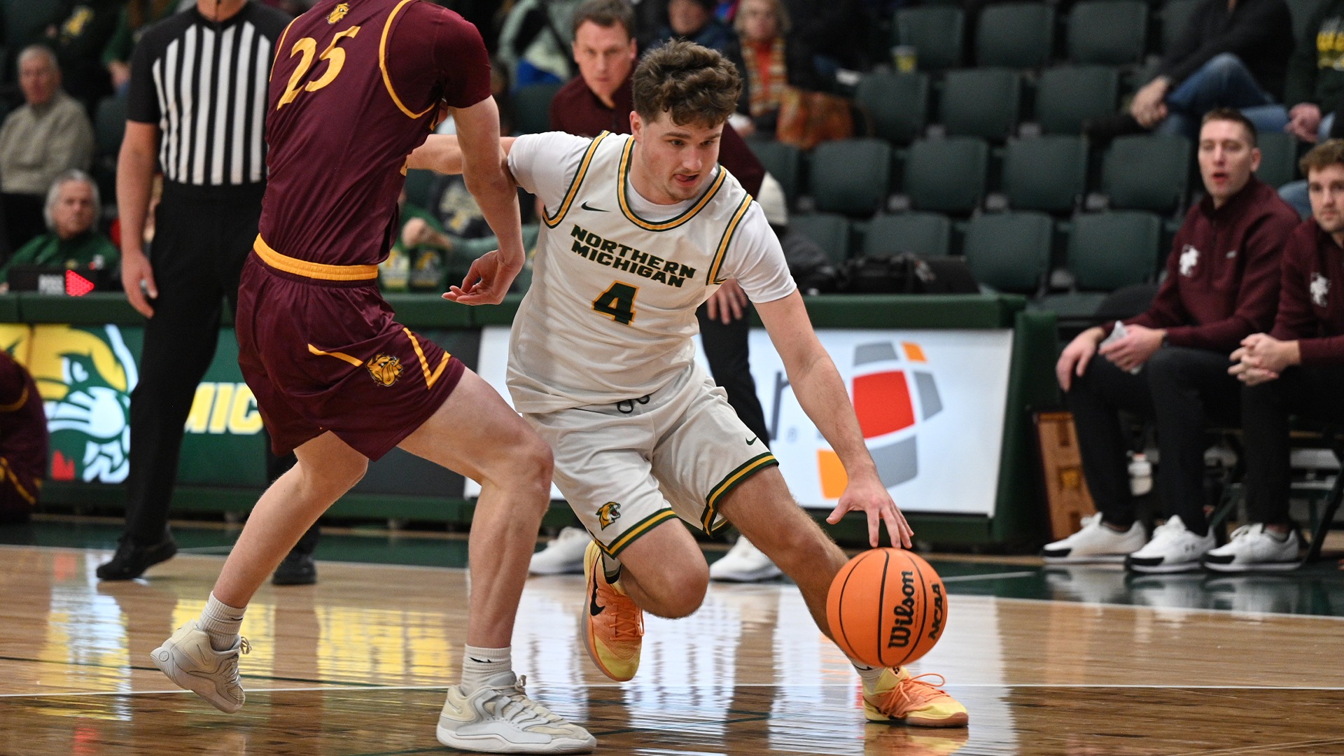 Cal Klesmit takes on a defender