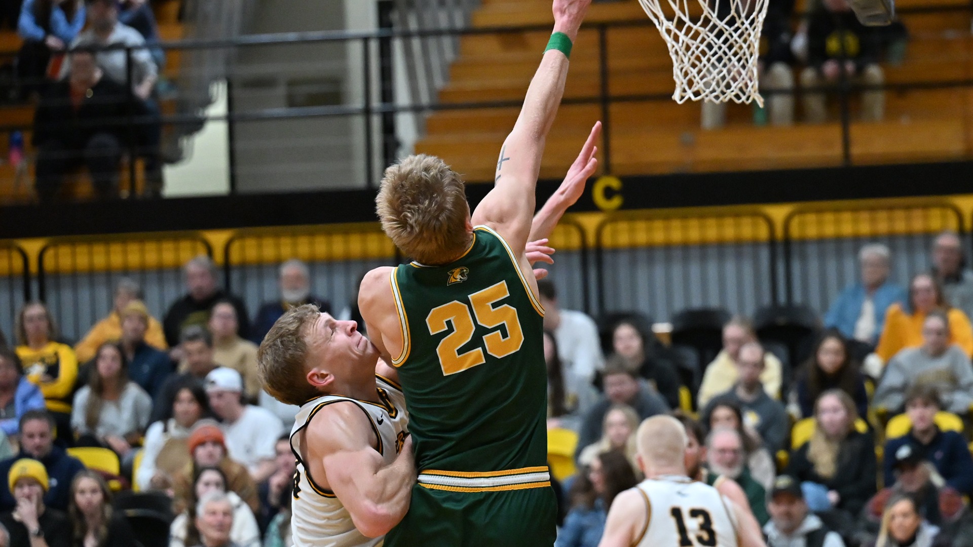 Dylan Kuehl goes up for a putback