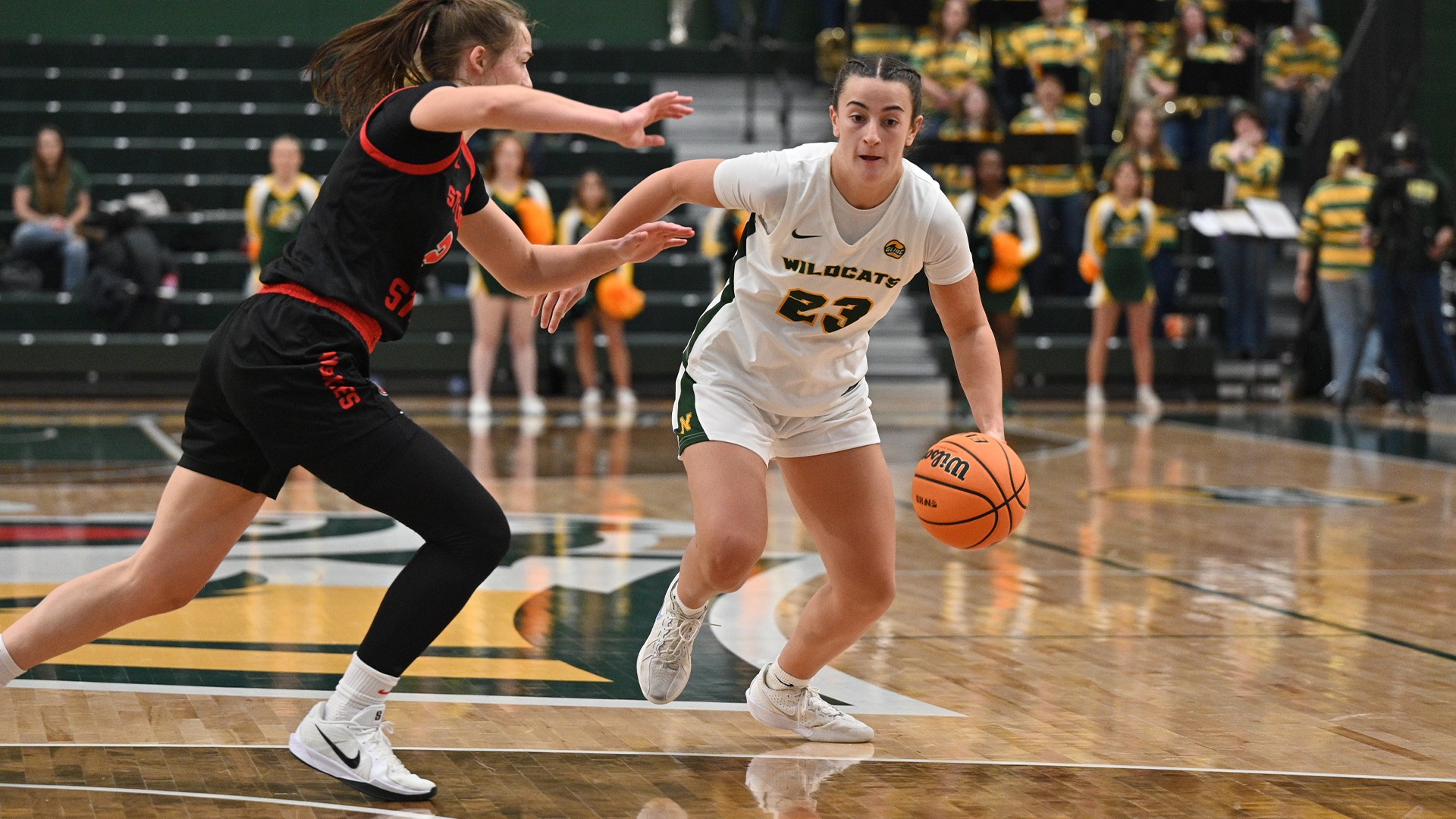 Jacy Weisbrod looks to drive past a defender