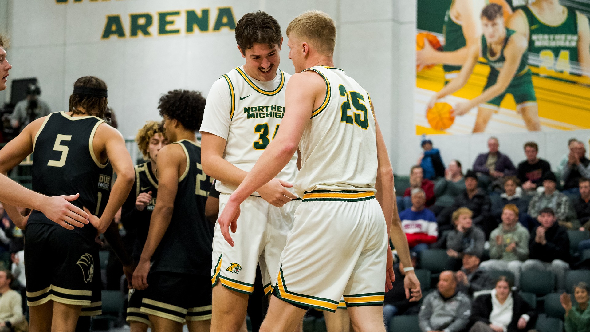 Dylan Kuehl and Sam Privet celebrate after a play