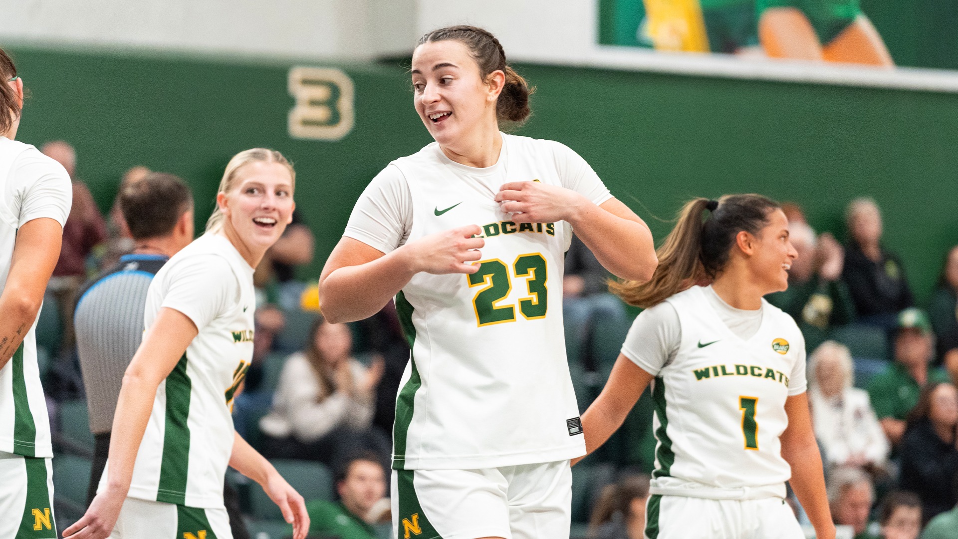 Jacy Weisbrod looks back to celebrate with a teammate