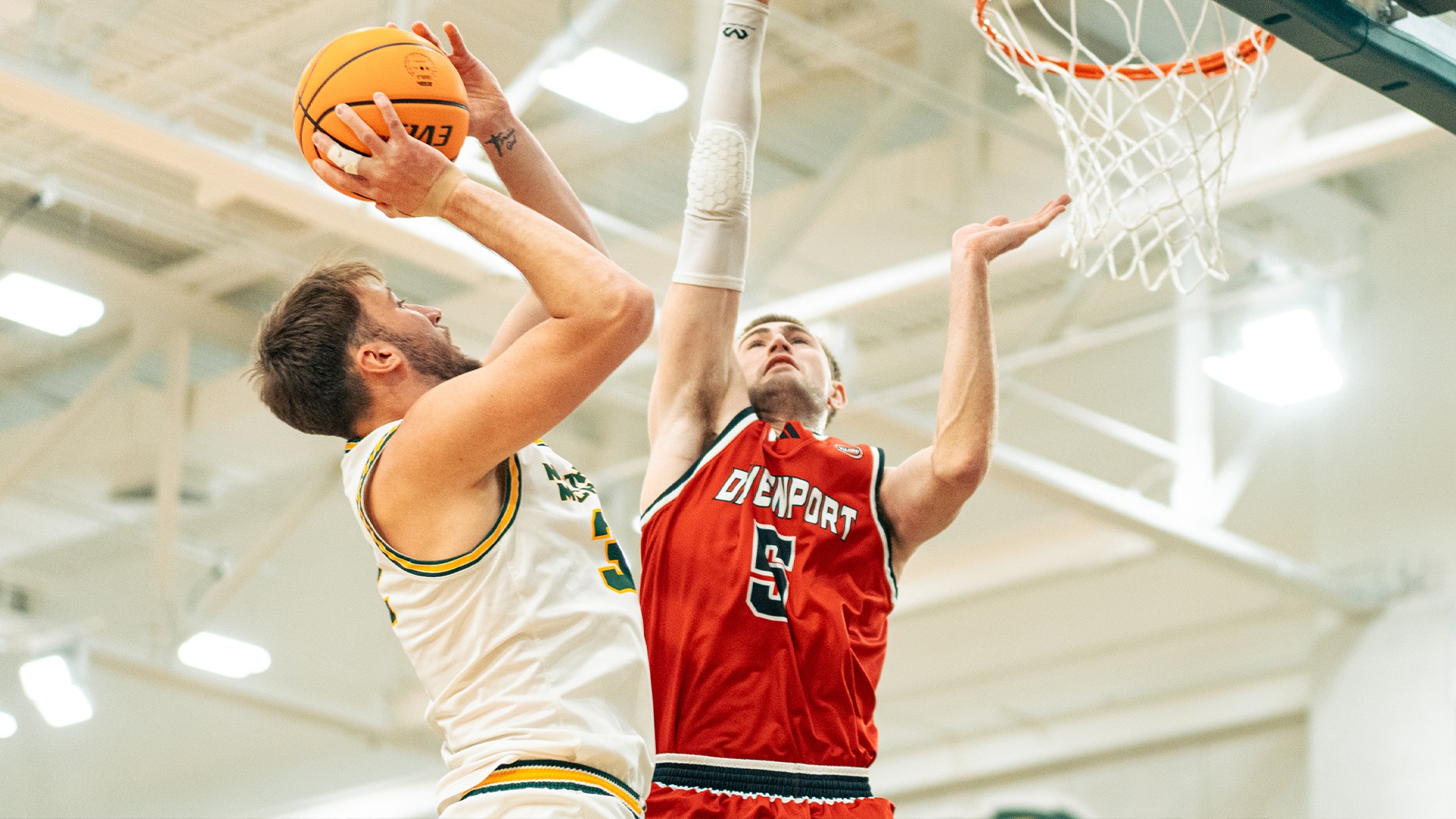 Jackson Dudek vs a DU defender