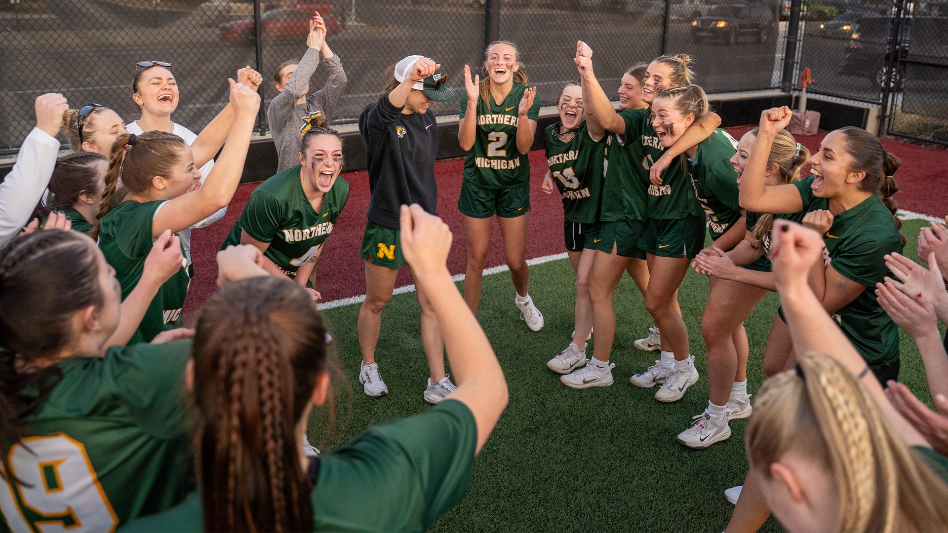 Lacrosse Celebrating a HUGE win over Colorado Mesa