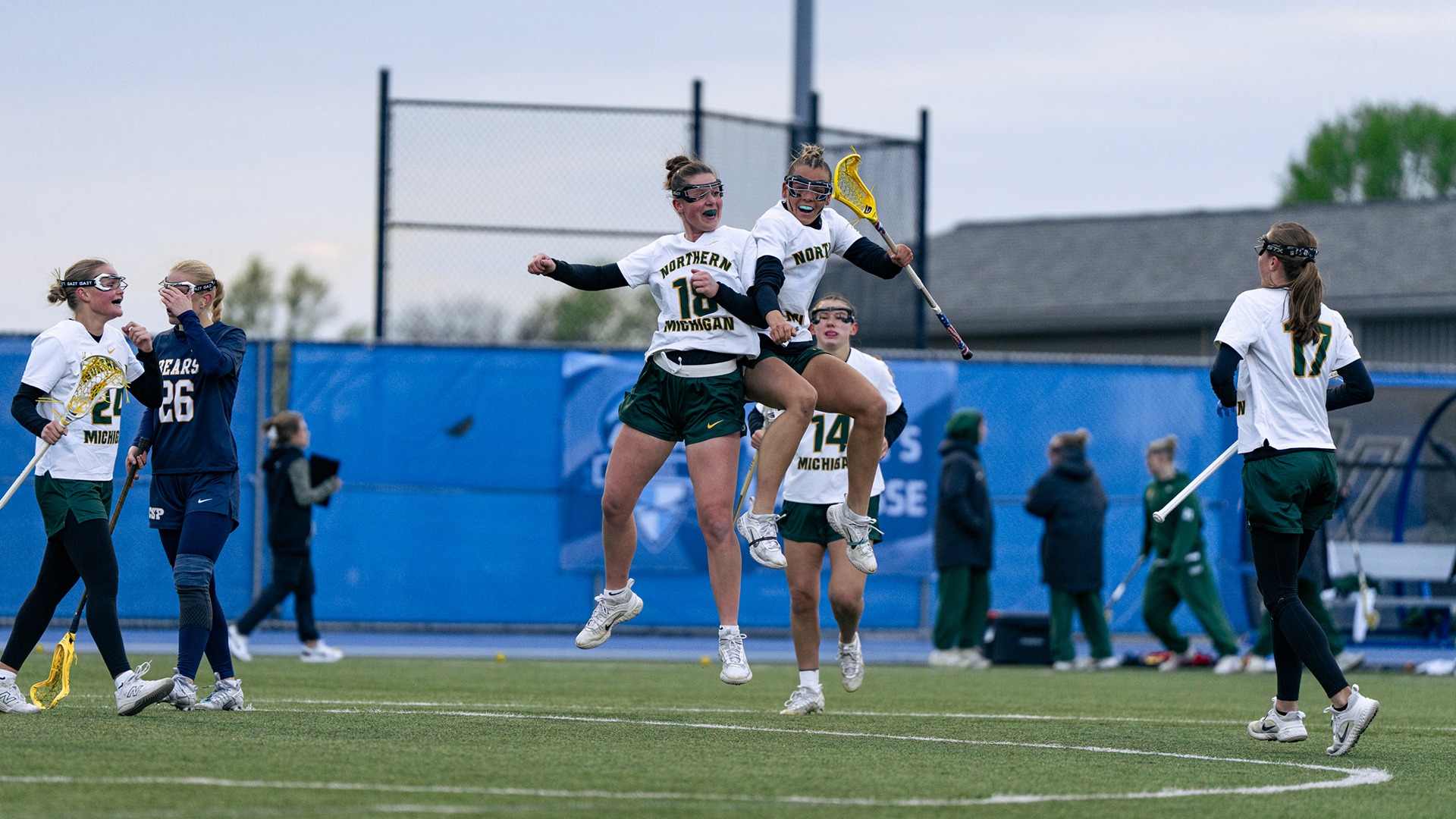 Avery Lorinser and Josie Lakosky celebrate a goal