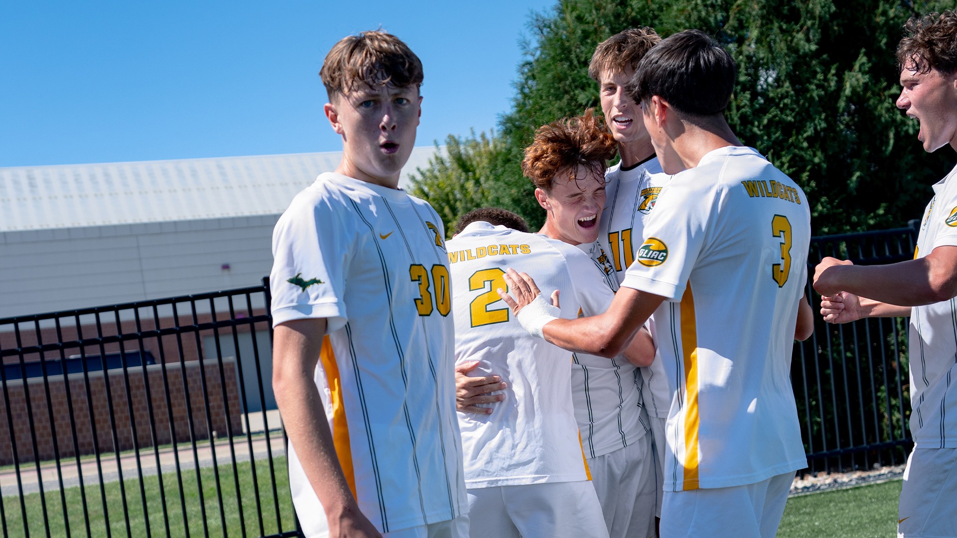 Sam Pilgrim, Luca Rosen, Ian Weimer and company celebrate from the SVSU Soccer Field