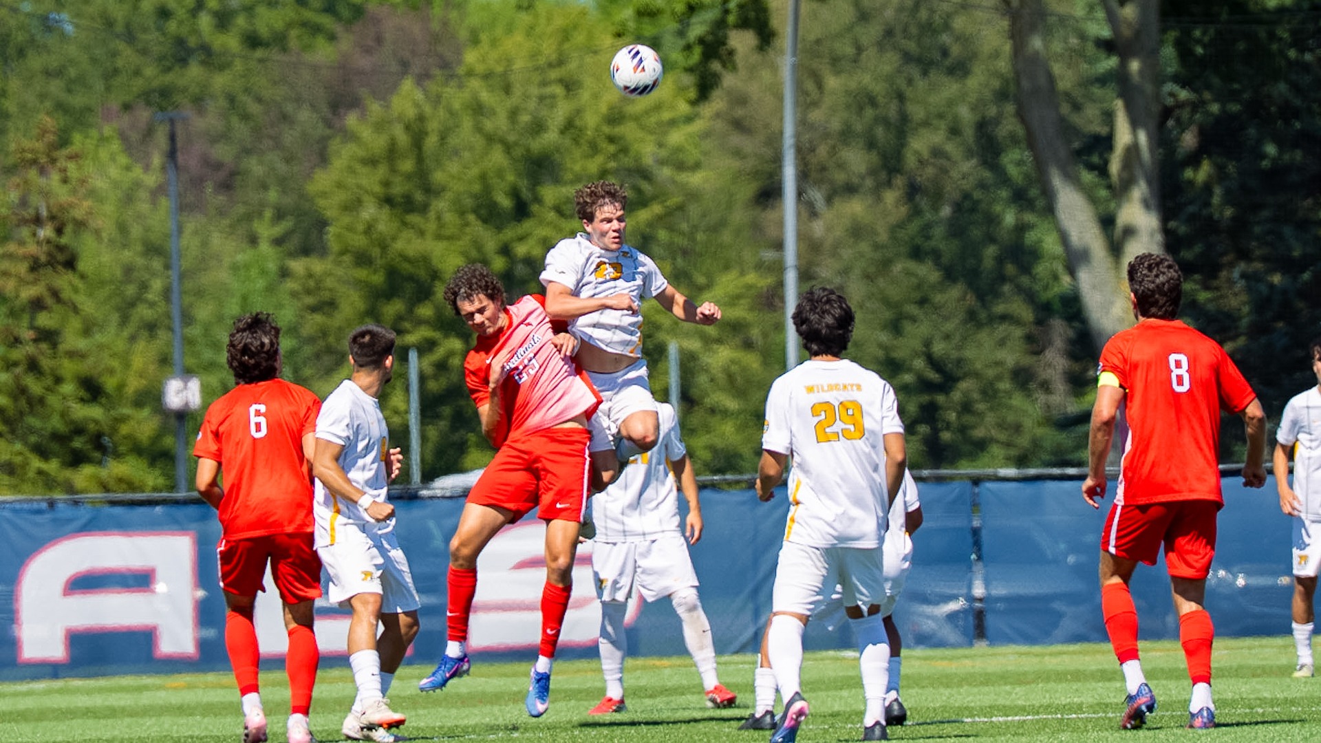 Noah Girard wins a header