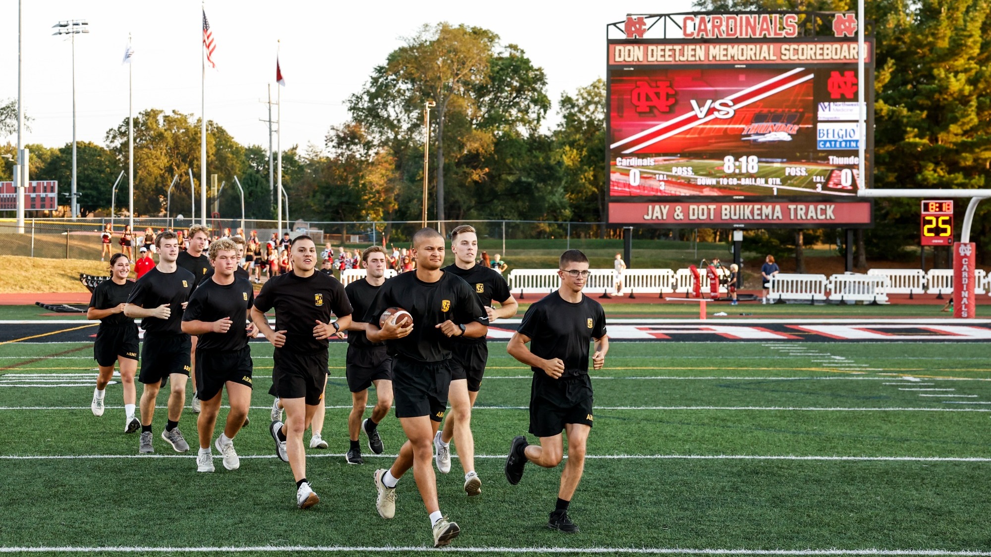 North Central & Wheaton ROTC cadets Game Ball Run