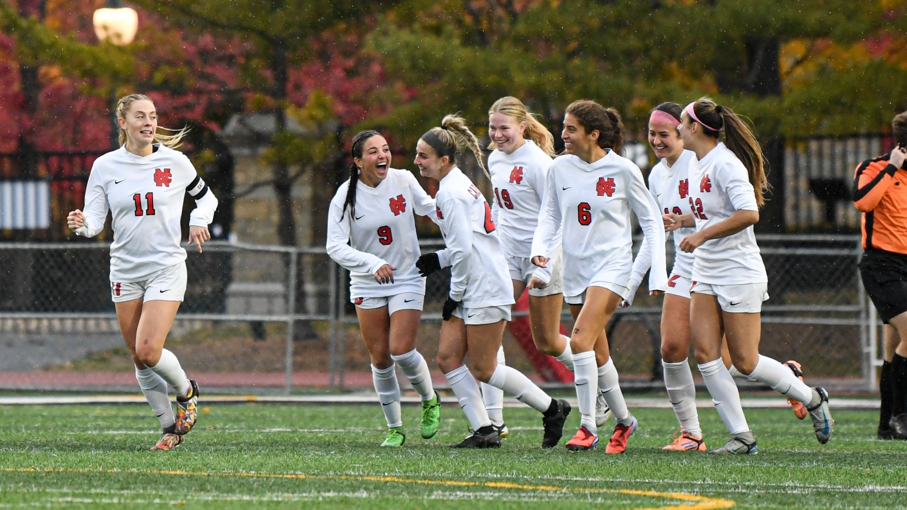 Women's soccer celebrates a goal in the CCIW Tournament Championships