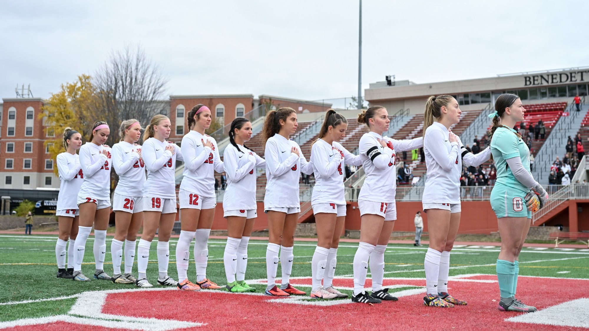 Women's Soccer lines up for national anthem before CCIW Championship game