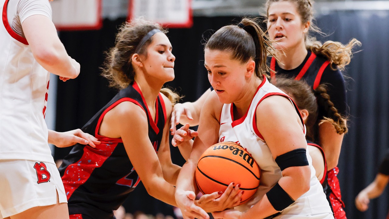 Ameli Sanchez battling for a jumpball against Benedictine University on Nov. 25 during the 2025-2026 season.