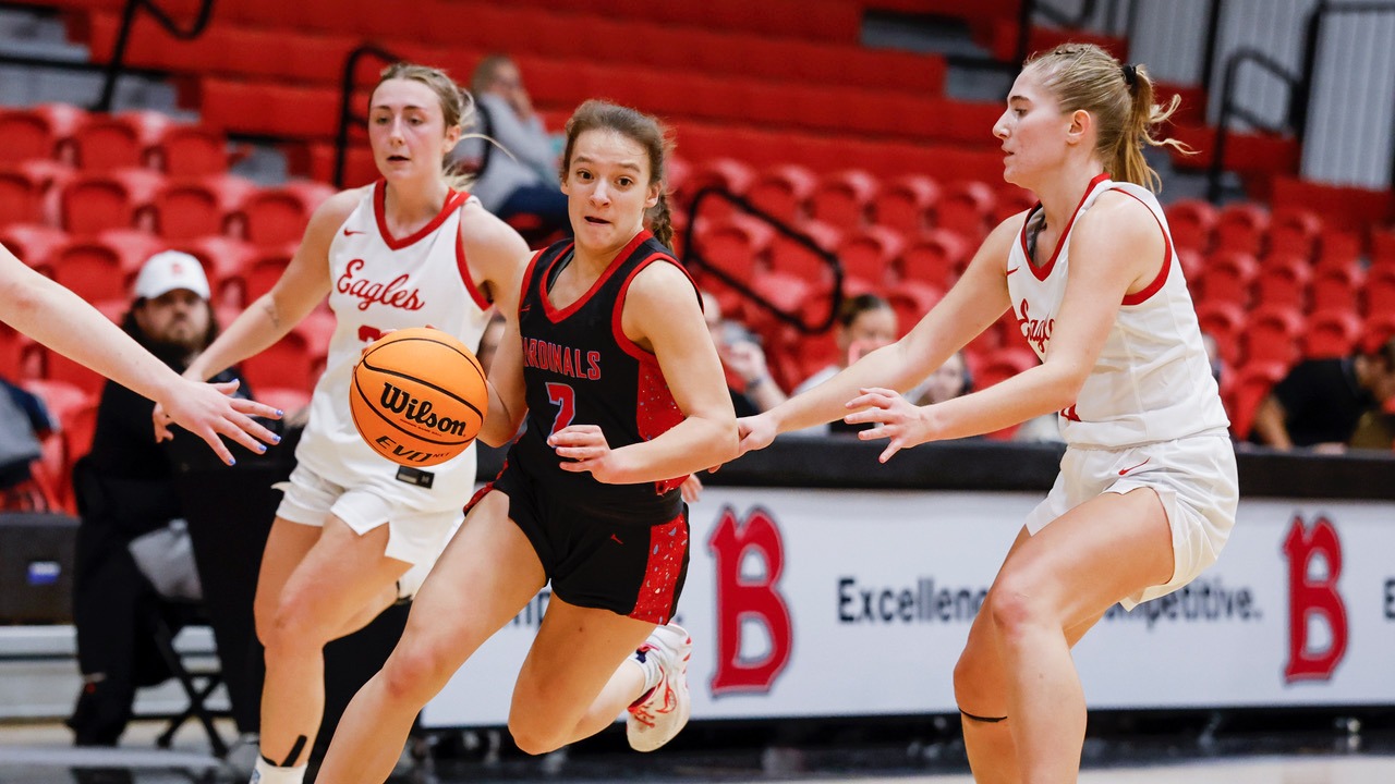 Dolly Smith dribbling down the court while being defended in the North Central vs Benedictine game on Nov. 25, 2025.