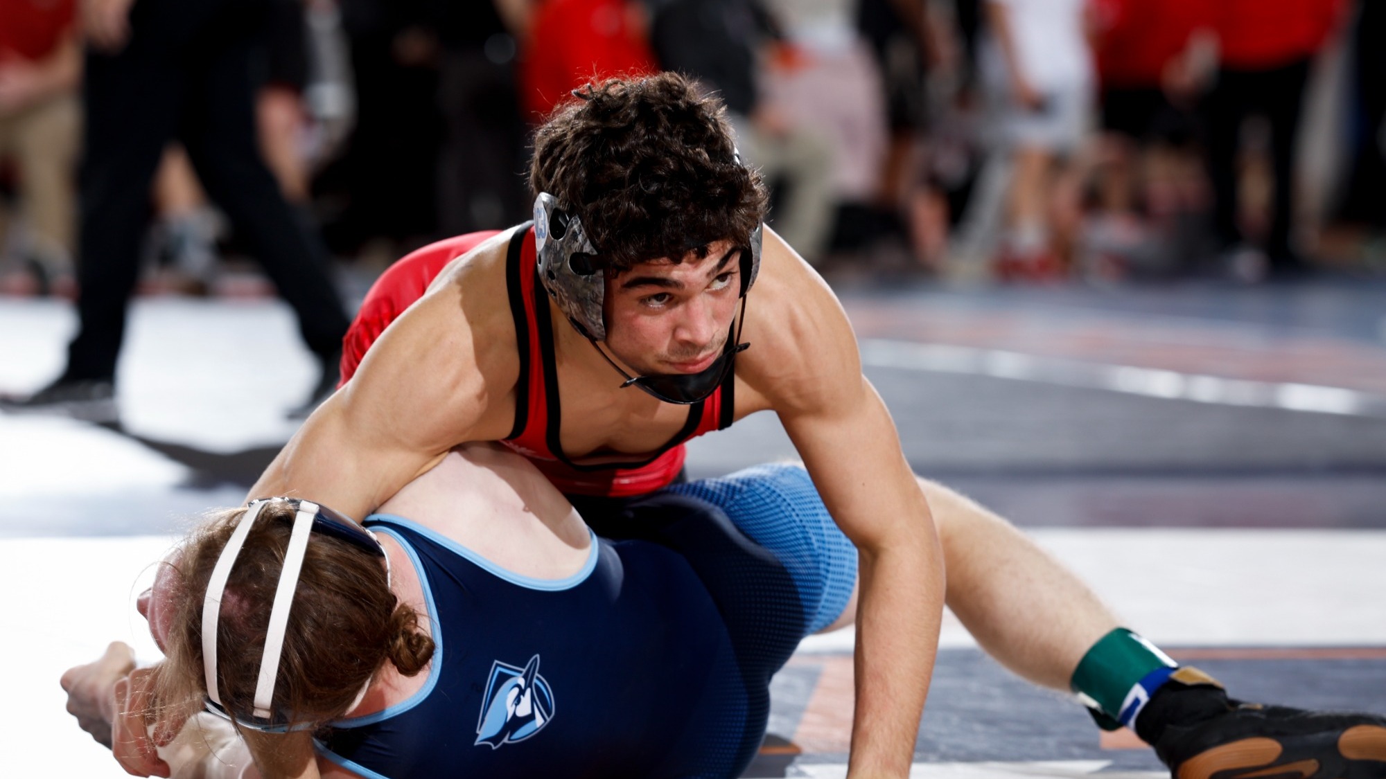 Chip Guzman with control of Elmhurst Wrestler