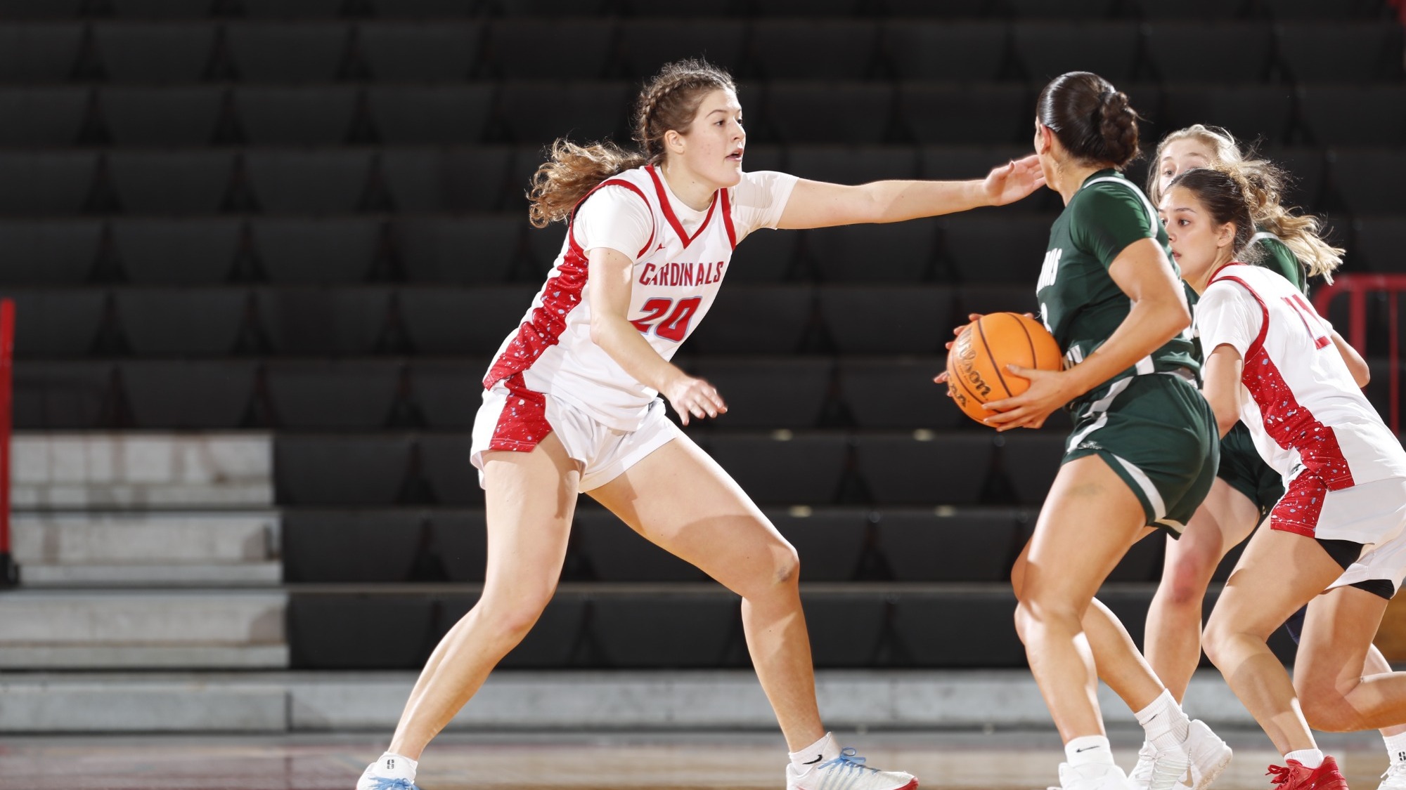 Biz Daly defending her Illinois Wesleyan opponent in their CCIW matchup on Dec. 6, 2025.