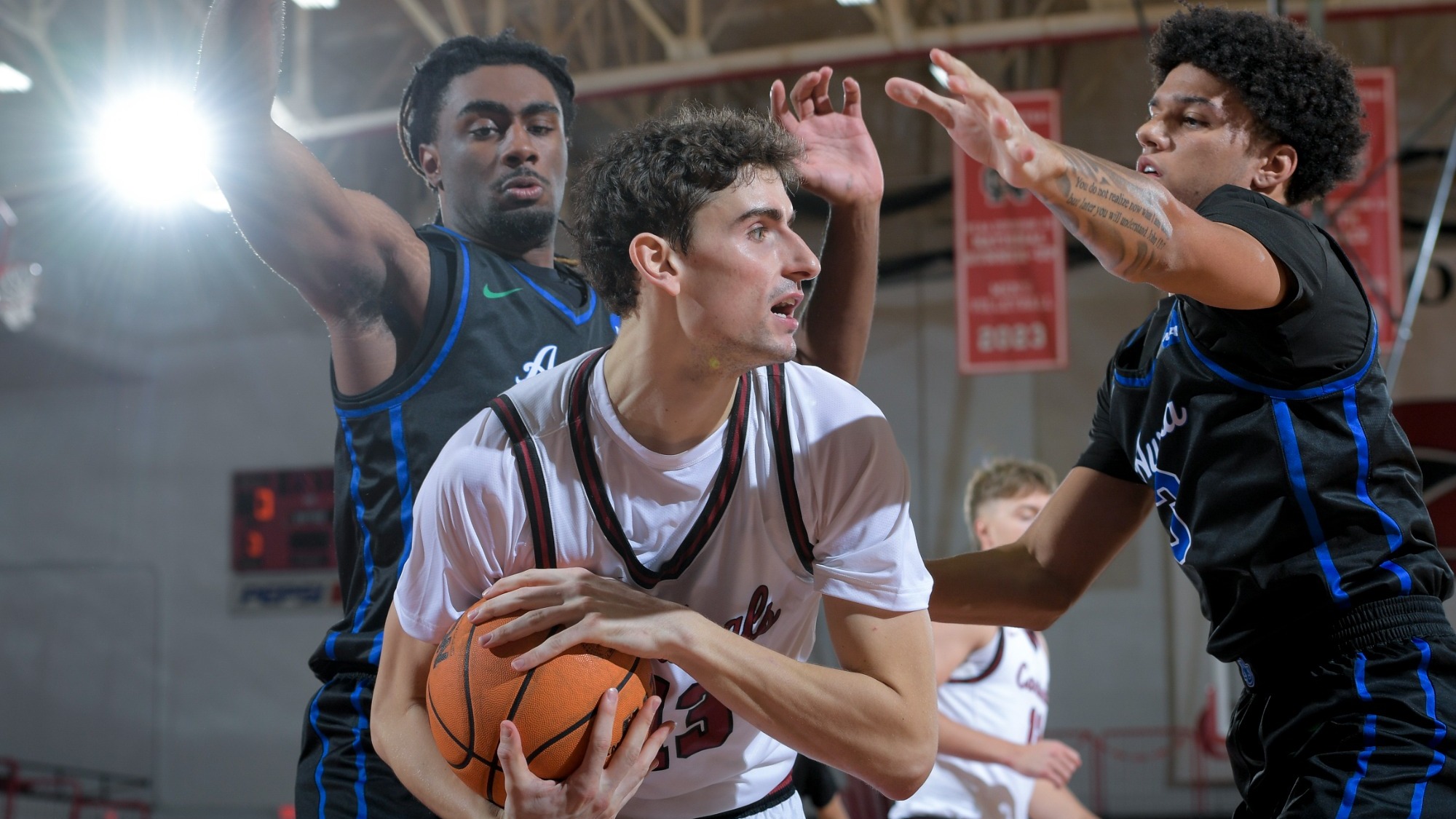 Ethan Marlowe grabbing a rebound