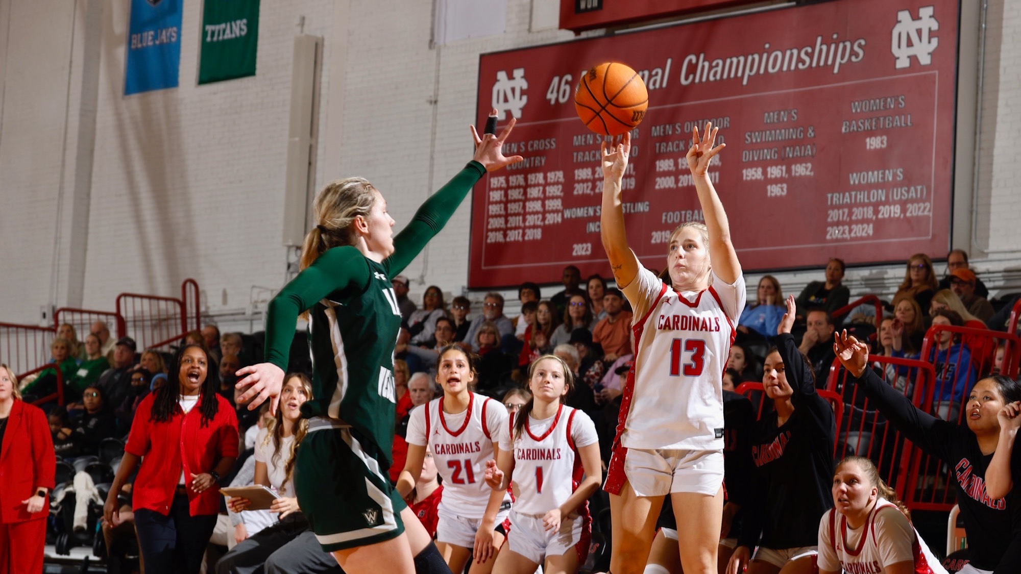 Kennedy Hartwig pulling up for a jumpsuit against Illinois Wesleyan on December, 6 2025.