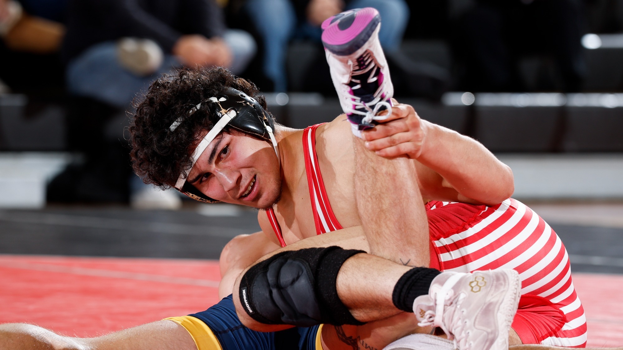 Jake Luce with control of wrestler