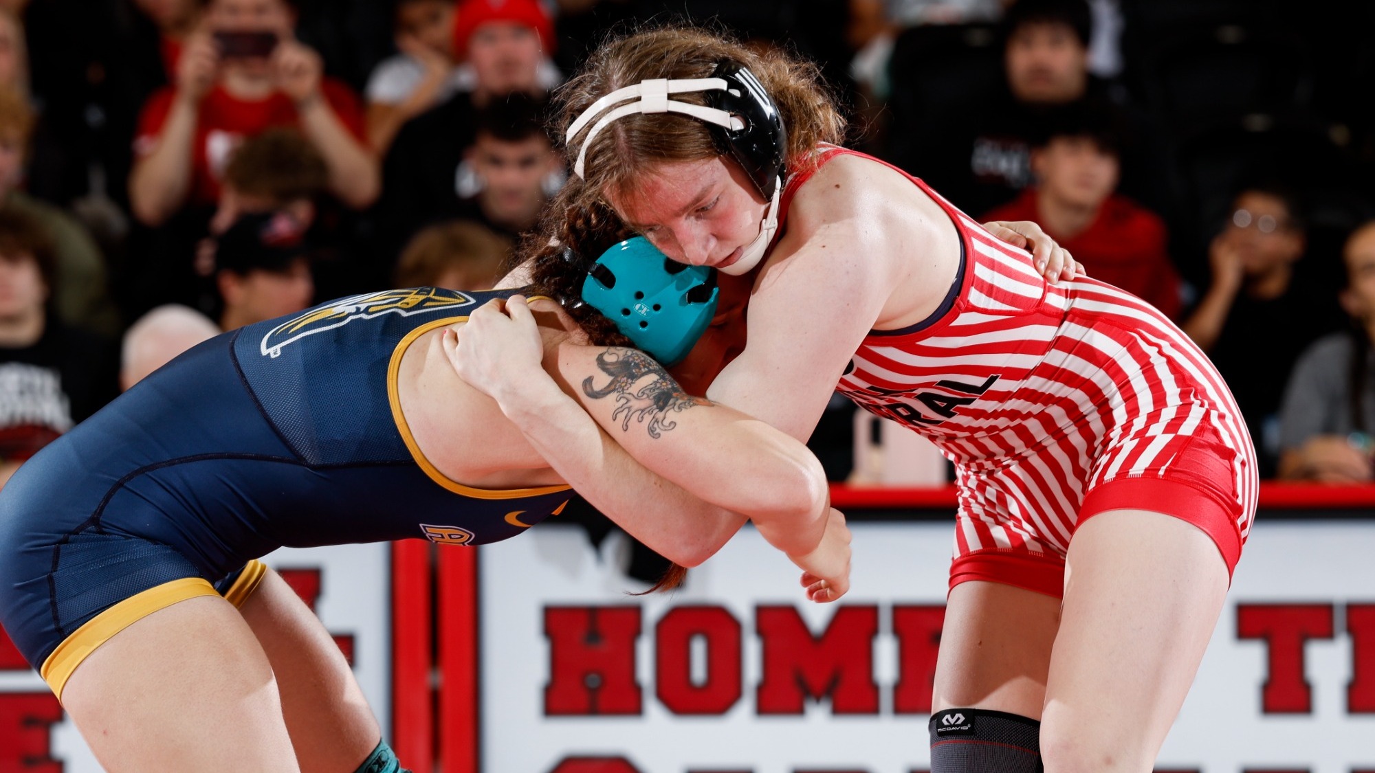 Lynn Horn wraps up opponent in Augustana dual