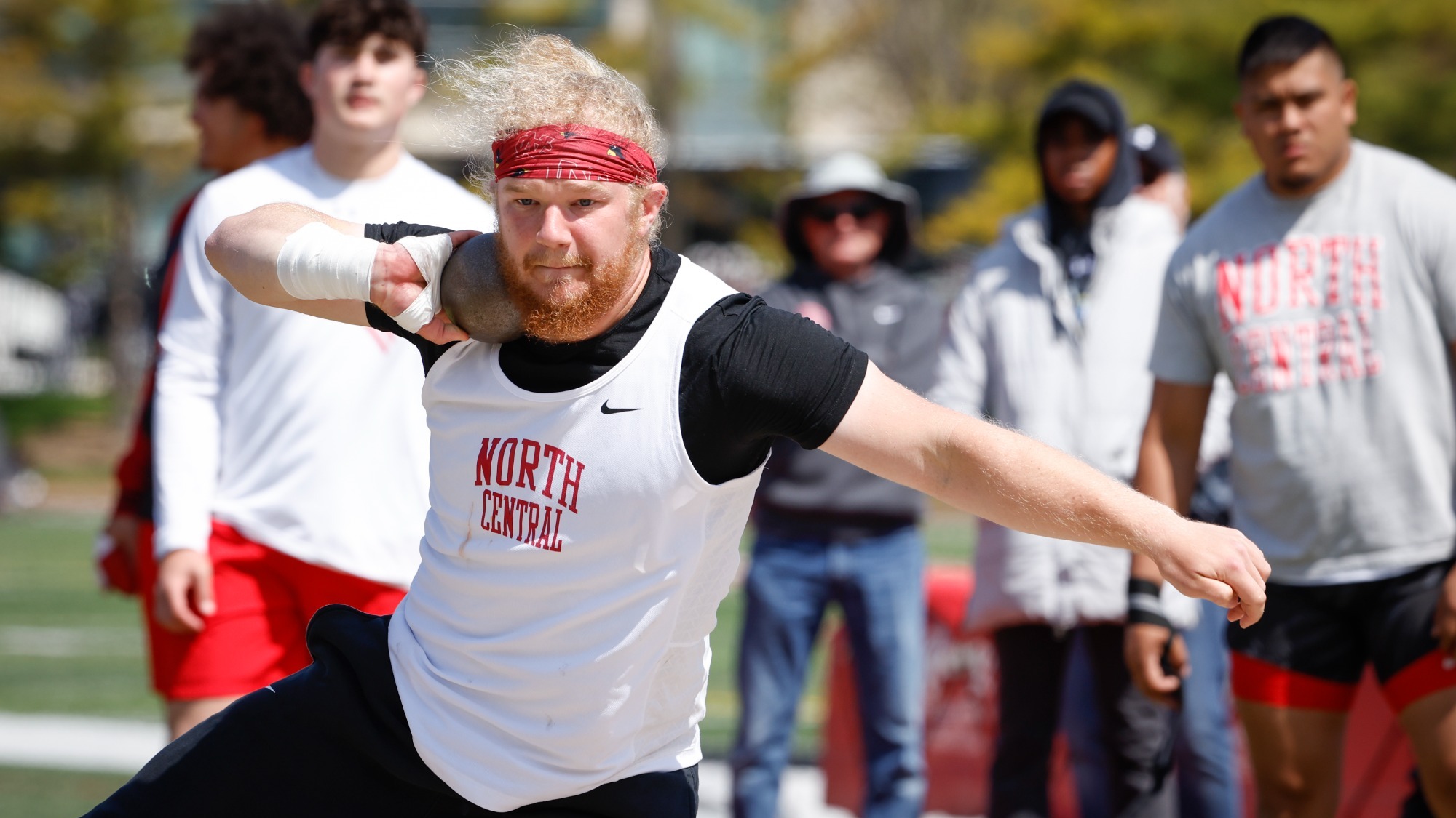 Anthony Zajac throwing shot put at CCIW Outdoor Championships