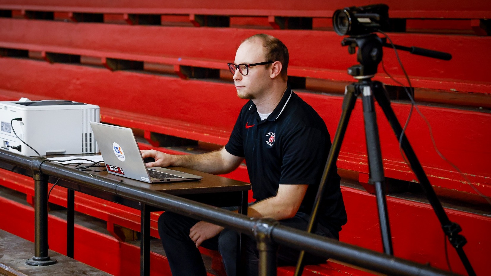 Nicholas Osterloo inputting statistics in Merner Field House