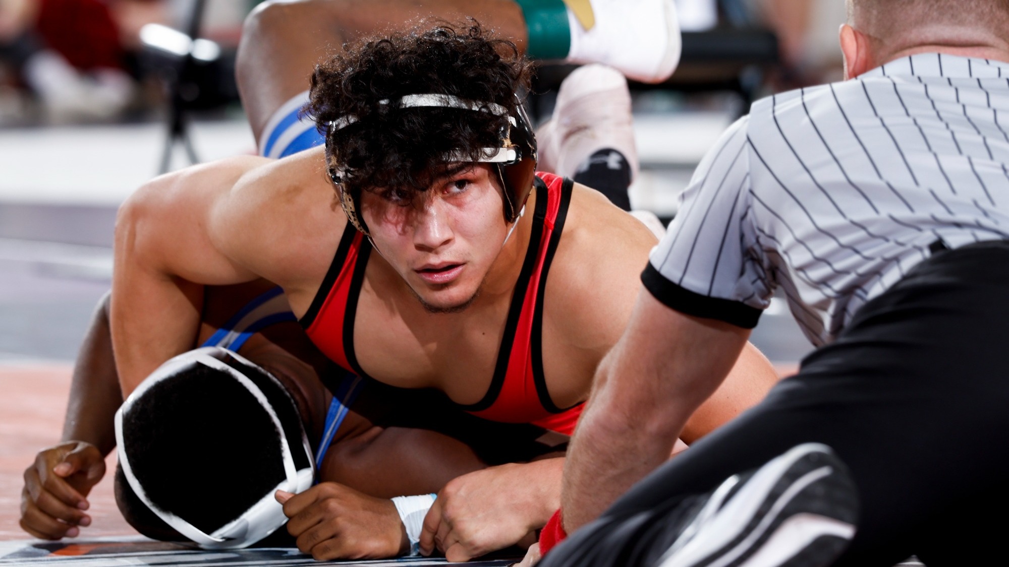 Jake Luce with top control of wrestler