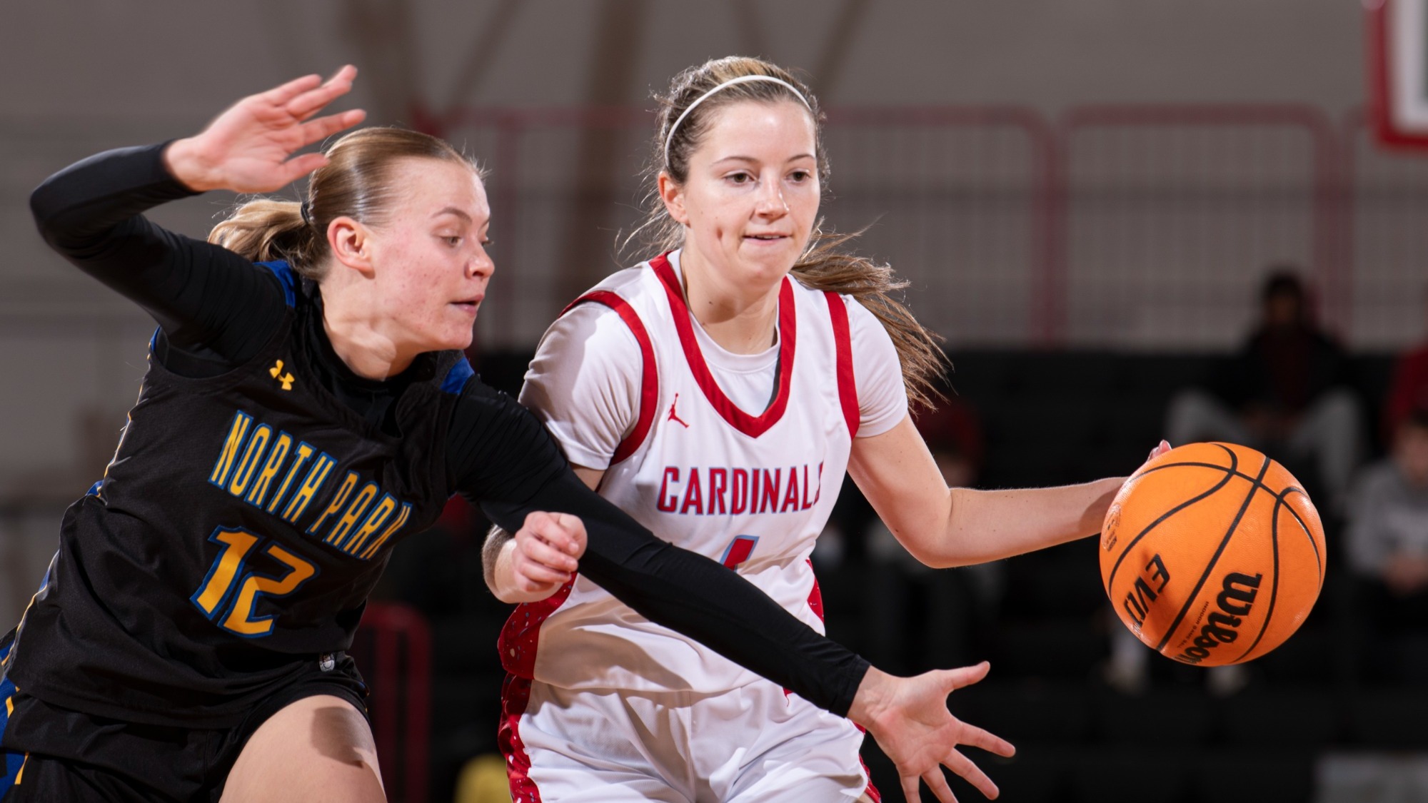 Cate Uhren dribbling her North Park defender during a College Conference of Illinois & Wisconsin matchup on Jan.3, 2026.