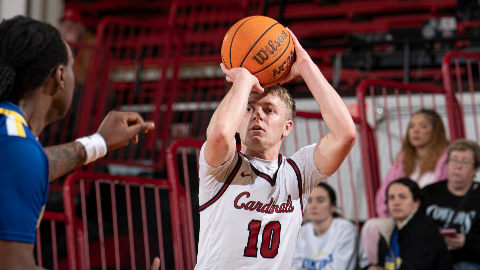 Seth Cheney hitting a three point jump shot