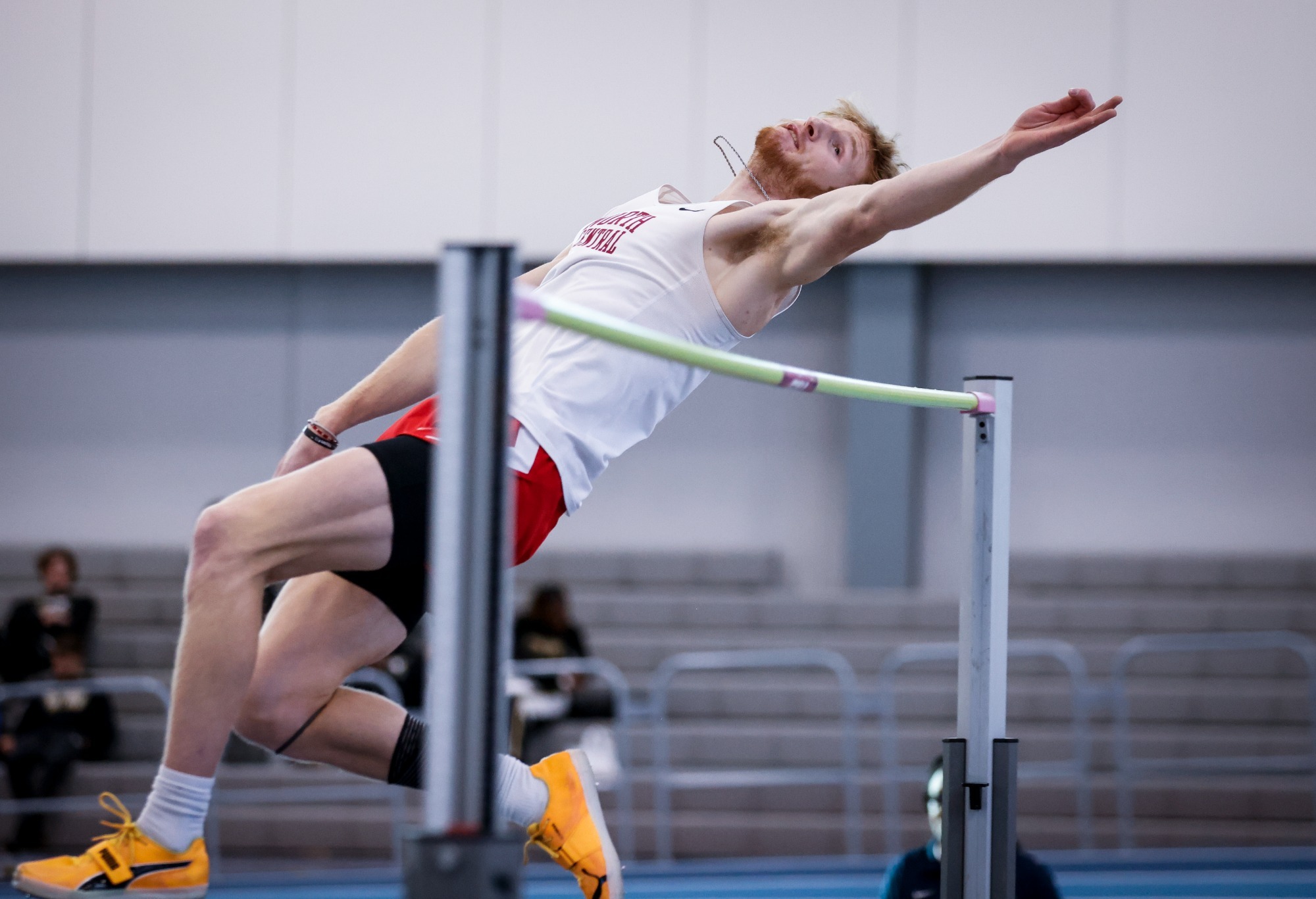 Cole Oleson high jumping