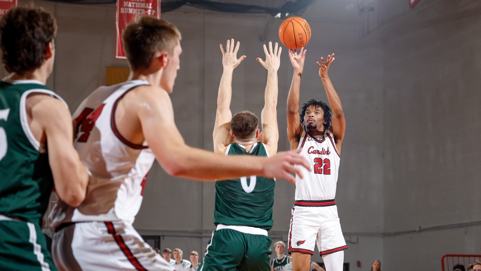 James Bullock Jr. shooting a three pointer