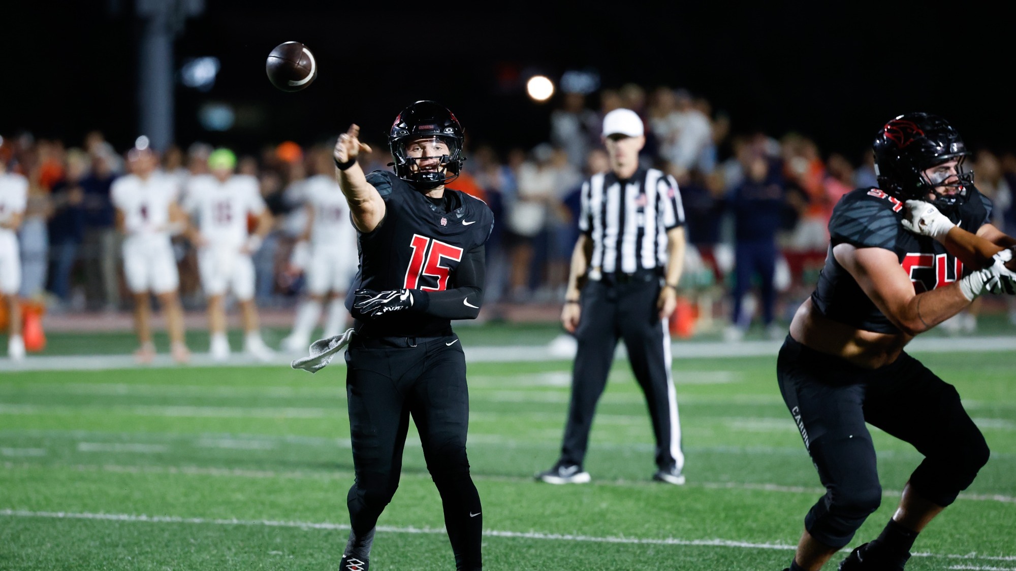 Garret Wilson throwing the football vs Wheaton