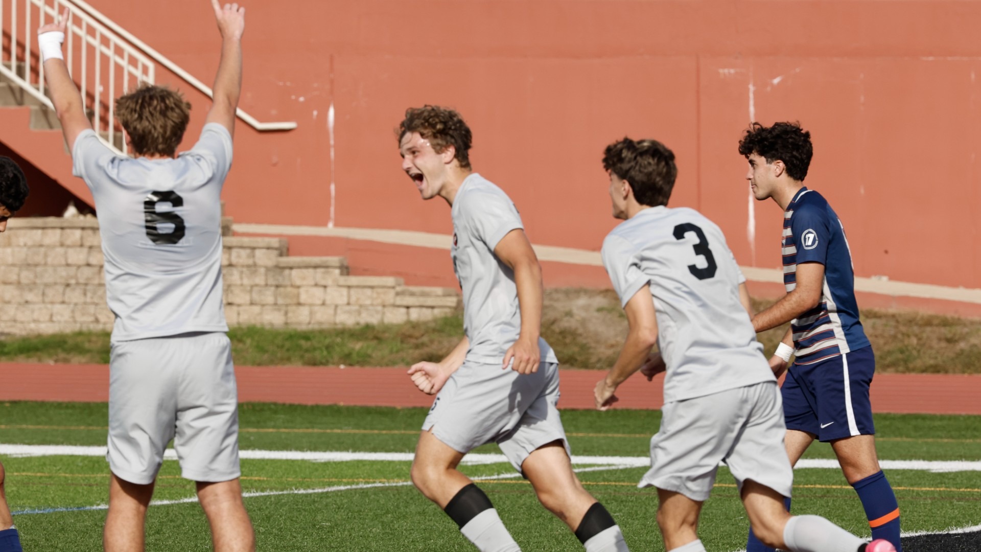The North Central College men's soccer team celebrating their homecoming win against Carroll University on Oct. 10, 2026 