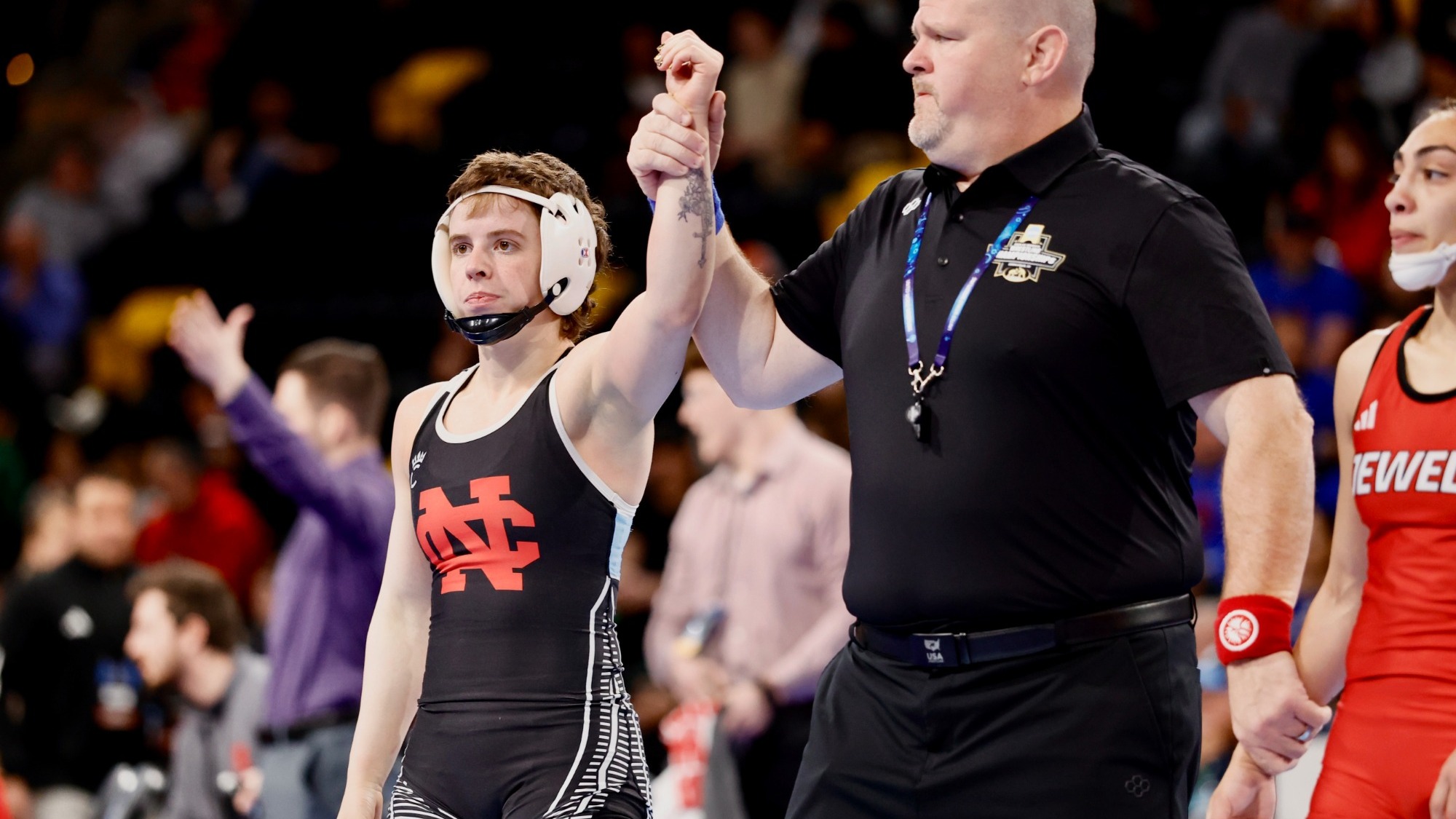 Kaelani Shufeldt arm raise after NCAA tournament win